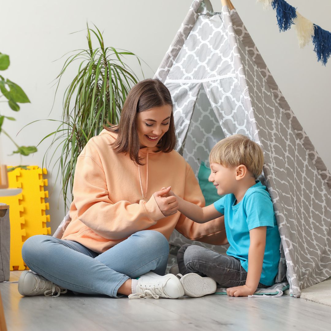 Nanny playing with a child