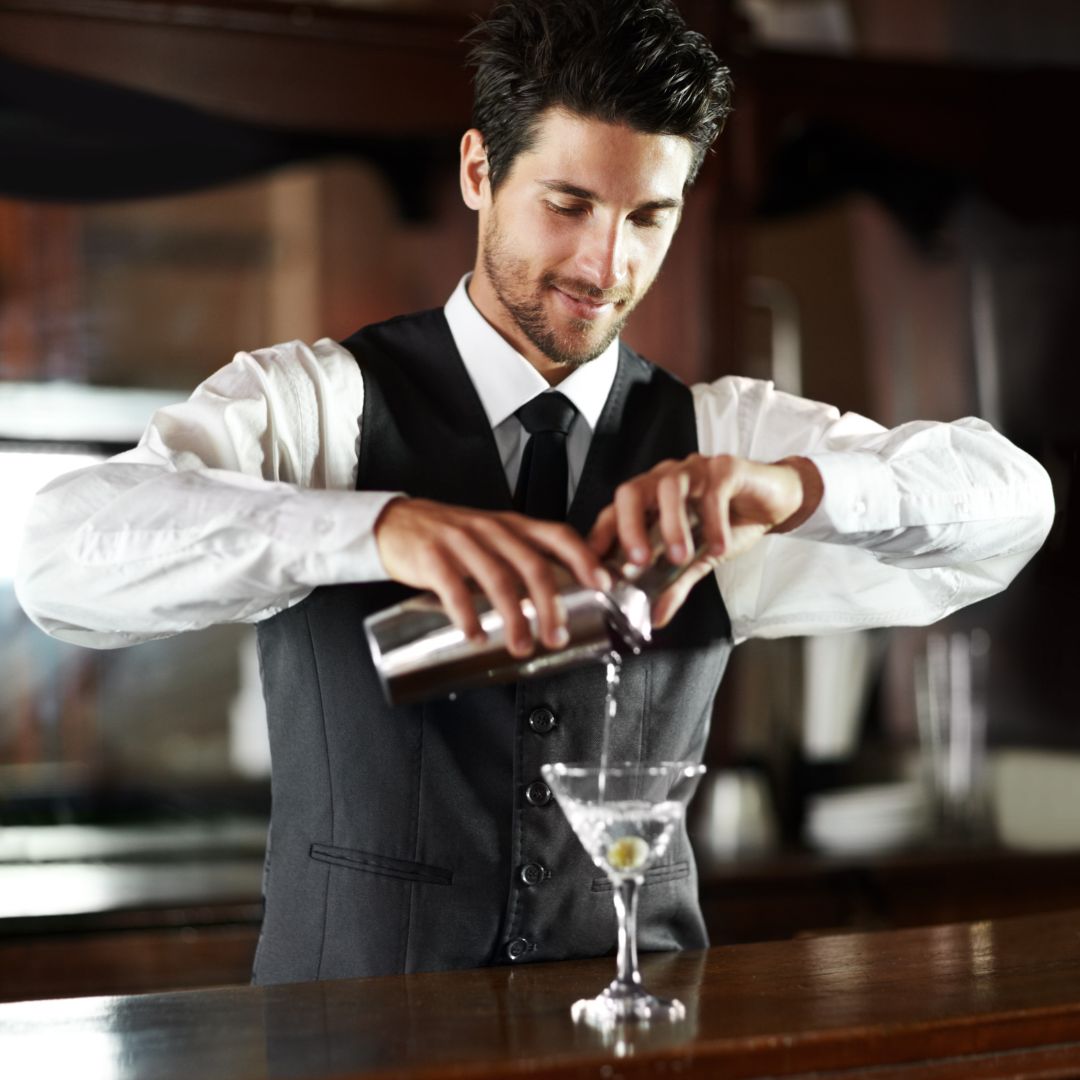 Mixologist preparing a cocktail